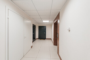 Russia, Moscow- April 17, 2020: interior public place, house entrance. doors, walls, staircase corridors