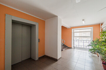 Russia, Moscow- April 17, 2020: interior public place, house entrance. doors, walls, staircase corridors