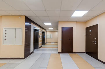 Russia, Moscow- April 17, 2020: interior public place, house entrance. doors, walls, staircase corridors