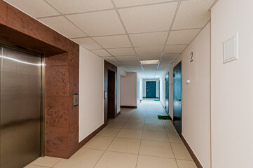 Russia, Moscow- April 17, 2020: interior public place, house entrance. doors, walls, staircase corridors