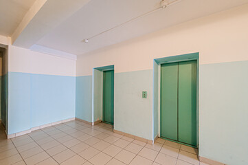 Russia, Moscow- April 17, 2020: interior public place, house entrance. doors, walls, staircase corridors