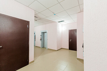 Russia, Moscow- April 17, 2020: interior public place, house entrance. doors, walls, staircase corridors
