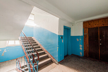 Russia, Moscow- April 17, 2020: interior public place, house entrance. doors, walls, staircase corridors, stairs, steps