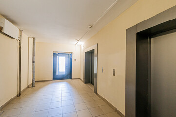 Russia, Moscow- April 17, 2020: interior public place, house entrance. doors, walls, staircase corridors