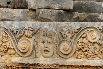 Stone faces in the ancient city of Myra in Demre, Antalya province in Turkey