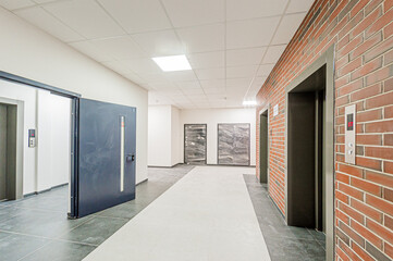 Russia, Moscow- April 17, 2020: interior public place, house entrance. doors, walls, staircase corridors