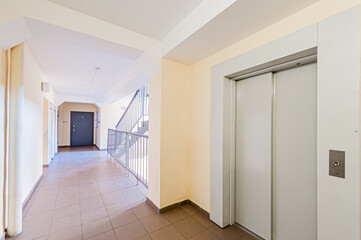 Russia, Moscow- April 17, 2020: interior public place, house entrance. doors, walls, staircase corridors