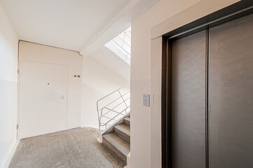 Russia, Moscow- April 17, 2020: interior public place, house entrance. doors, walls, staircase corridors
