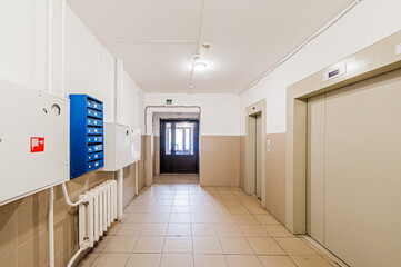 Russia, Moscow- April 17, 2020: interior public place, house entrance. doors, walls, staircase corridors