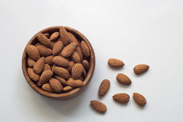 Roasted almonds on an insulated table. varieties of almonds grown in Turkey is more. There are various types of almonds such as roasted, candied, chocolate.