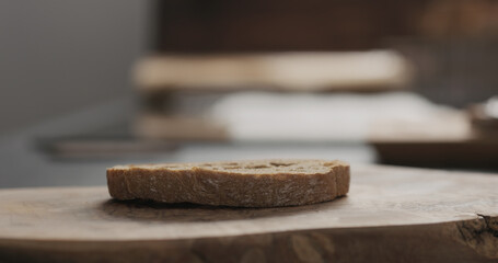 rustic ciabatta slice on wood board
