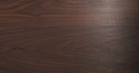 background texture of dark toned black walnut surface