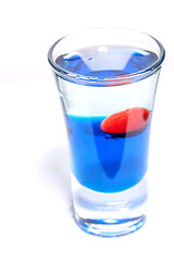 alcoholic cocktail cherry with blue syrup