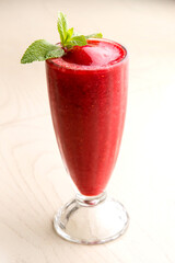 cherry shake with frozen pulp and mint