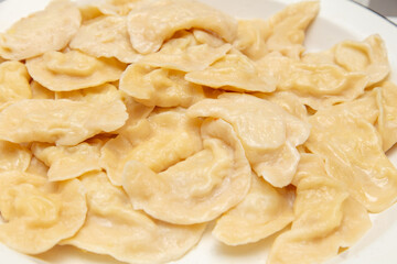 Dumplings cooked in a saucepan.