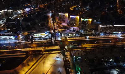 Top view of the night city with lights and lanterns