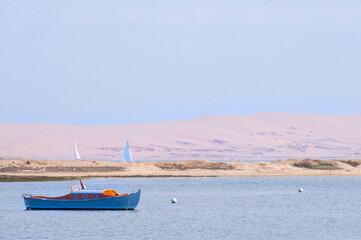 View of a wood pinasse boat on the see