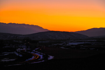 Naklejka na ściany i meble beautiful sunset over the mountains
