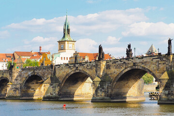 Fototapeta na wymiar Charles bridge, historical center of Prague, buildings and landmarks, Vltava river. Prague, Czech Republic
