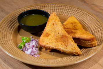 Indian Fried Snack Bread Pakora or Bread Bhaji a Common Street Food, it is Made From Bread Slices, Gram Flour, and Spices Among other Ingredients