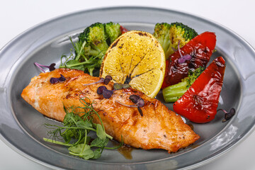 Roasted salmon fillet with vegetables