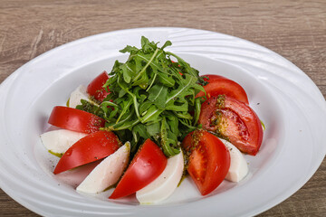 Traditional Italian Caprese salad with mozarela