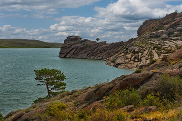 Fototapeta premium Eastern Kazakhstan. Around the mountains of Bayanaul are three beautiful lakes, one of which is the lake Toraigyr.