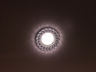Included glowing lamp on the ceiling