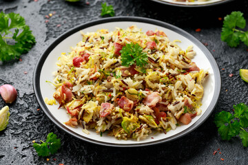 Fried Brussels sprouts with rice and crispy bacon