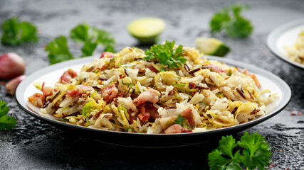 Fried Brussels sprouts with rice and crispy bacon
