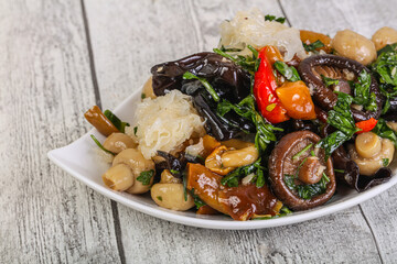 Pickled asian mushroom mux with herbs