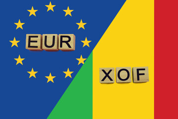 United Europe and Mali currencies codes on national flags background