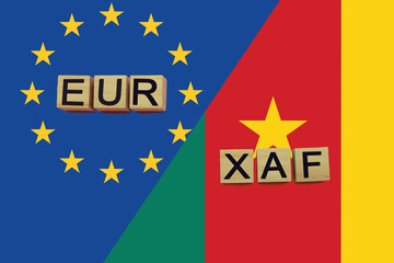 United Europe and Cameroon currencies codes on national flags background
