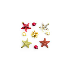 Christmas tree toys, red and gold stars, balls on a white background. 