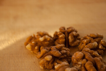 Walnuts, a bunch of peeled walnuts on a white background.