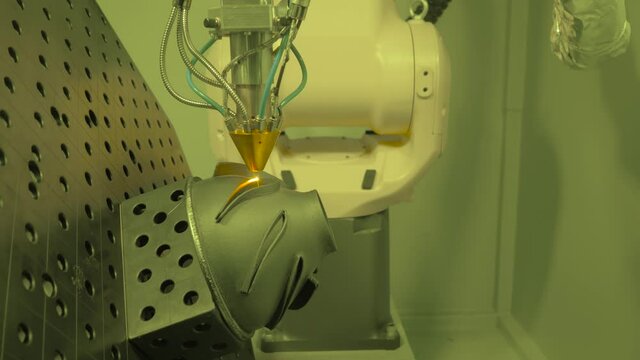 Direct metal deposition - advanced additive laser melting and powder spray manufacturing technology for repair, rebuild metal workpieces. Metalworking, robotic, industrial concept