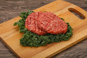 Raw beef burger cutlet for cooking