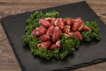 Raw chicken hearts for cooking