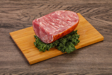 Beef ham piece over board