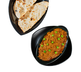Rajasthani Famous Traditional Cuisine Haldi Sabji or Tukkar Served with Salad on White Background