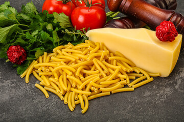 Italian pasta raw Maccheroni for cooking