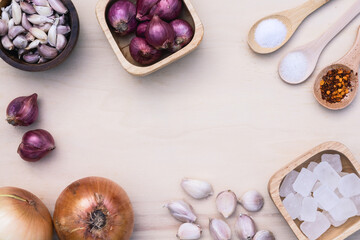 Many dry ingredients arrangement on wood chopping board with copy space
