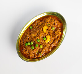Rajasthani Famous Traditional Cuisine Haldi Sabji or Tukkar Served with Salad on White Background