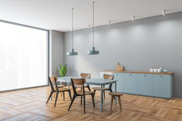 Grey and wooden dining room with wooden minimalist furniture on parquet