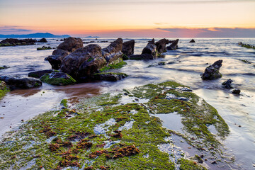 Barrika wild beach at sunset, Biscay, Basque Country, Spain.