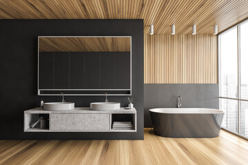 Wooden and black bathroom with bathtub and two sinks, parquet floor