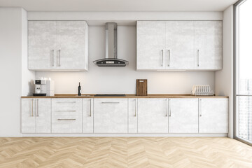 White cupboards in modern white kitchen