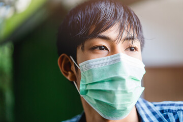 Health protection, safety covid19.Close up asian boy in protective medical mask.Asian preteen tween...