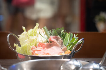 Shabu Shabu or Sukiyaki, a popular dish of pork, beef and fresh vegetables.