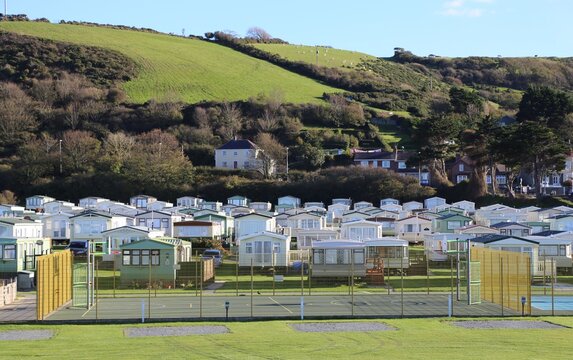 A Coastal Caravan Park Showing Static Caravans Sited Between The Sea And The Hills At Aberaeron, Ceredigion, Wales, UK.